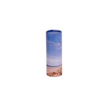 A small scatter tube with a beach design