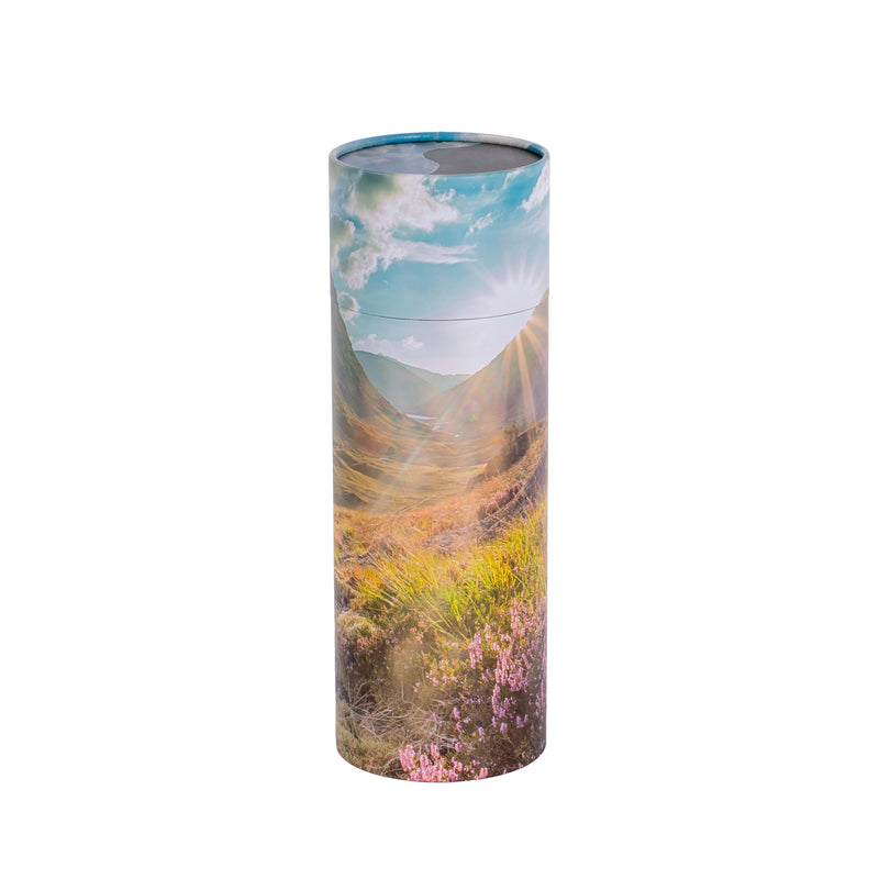 A large scatter tube with a mountains design