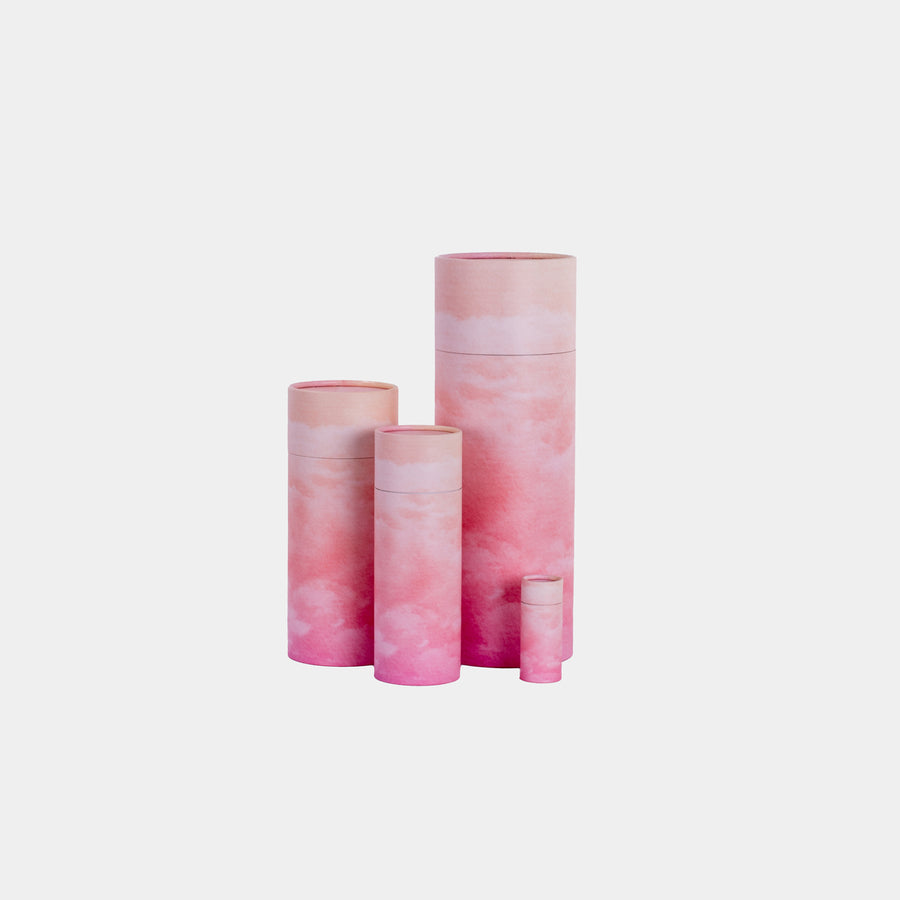 A group of pink skies design scatter tubes showing, keepsake, small, medium and large sizes 