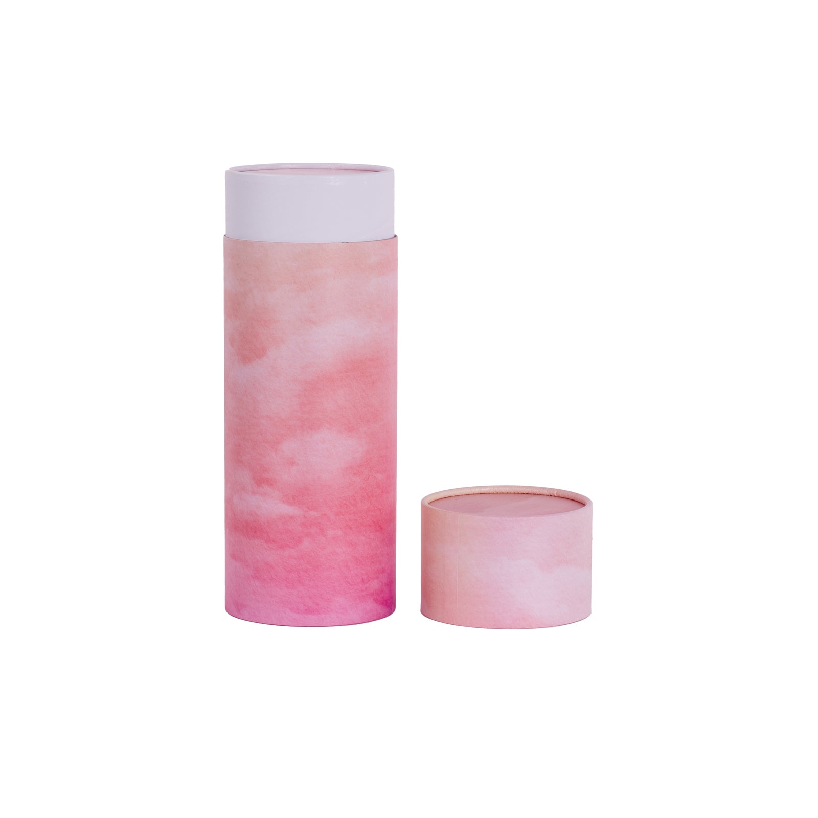 A scatter tube with the lid removed showing a pink skies design