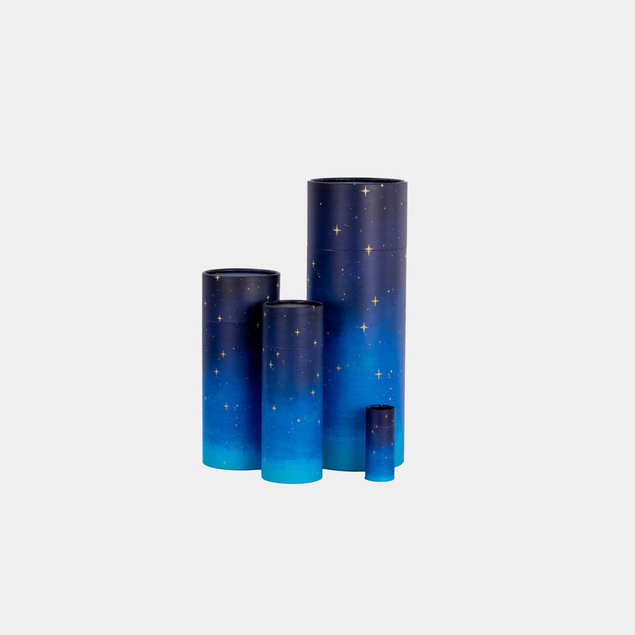 A group of starry night design scatter tubes showing, keepsake, small, medium and large sizes 